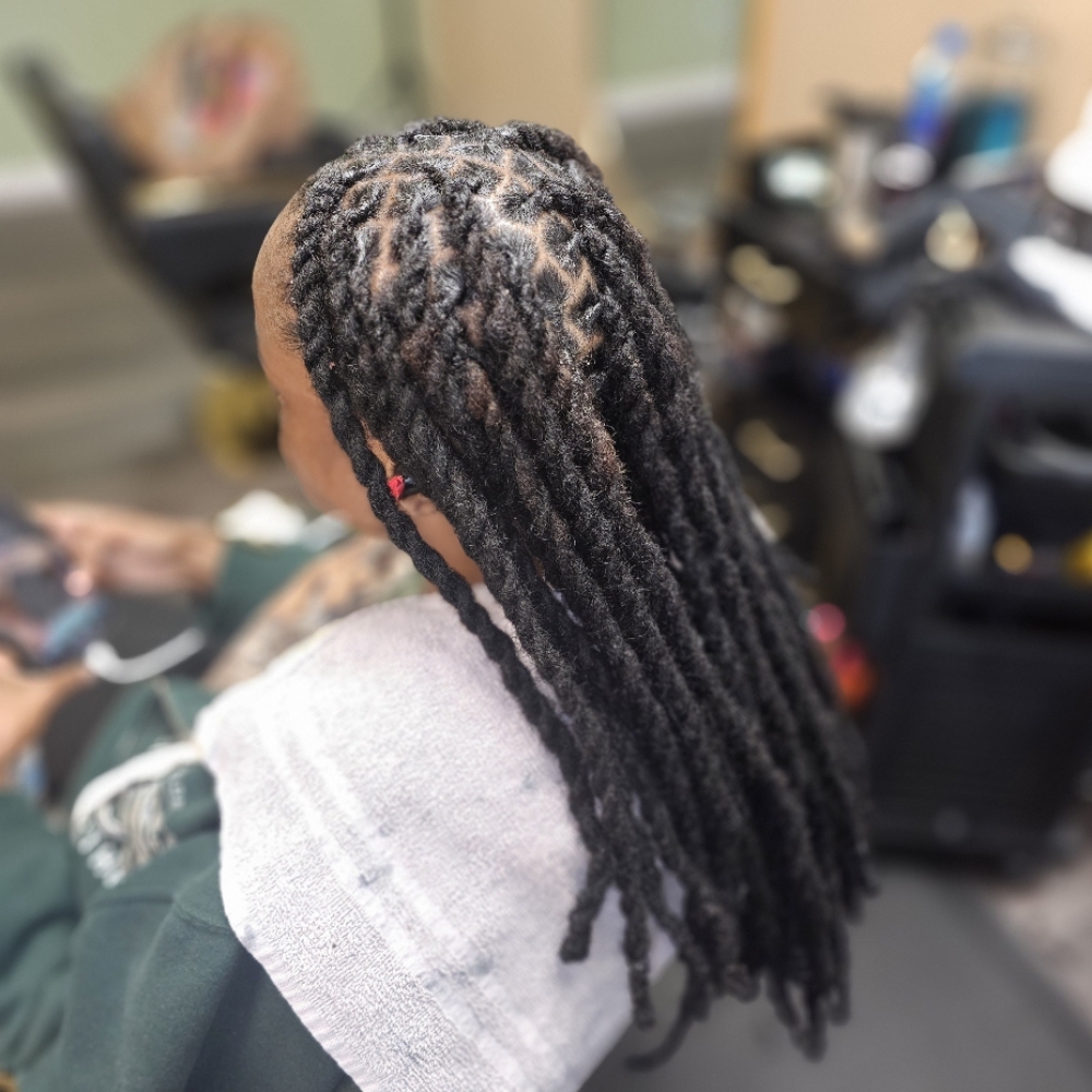 Locs 2 Strand Twist (Medium-Long) at Kinky Rootz242 Natural Hair Studios LLC in Ft Lauderdale, FL