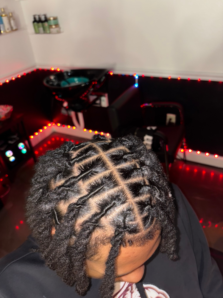 50 or Less Loc Retwist & Style