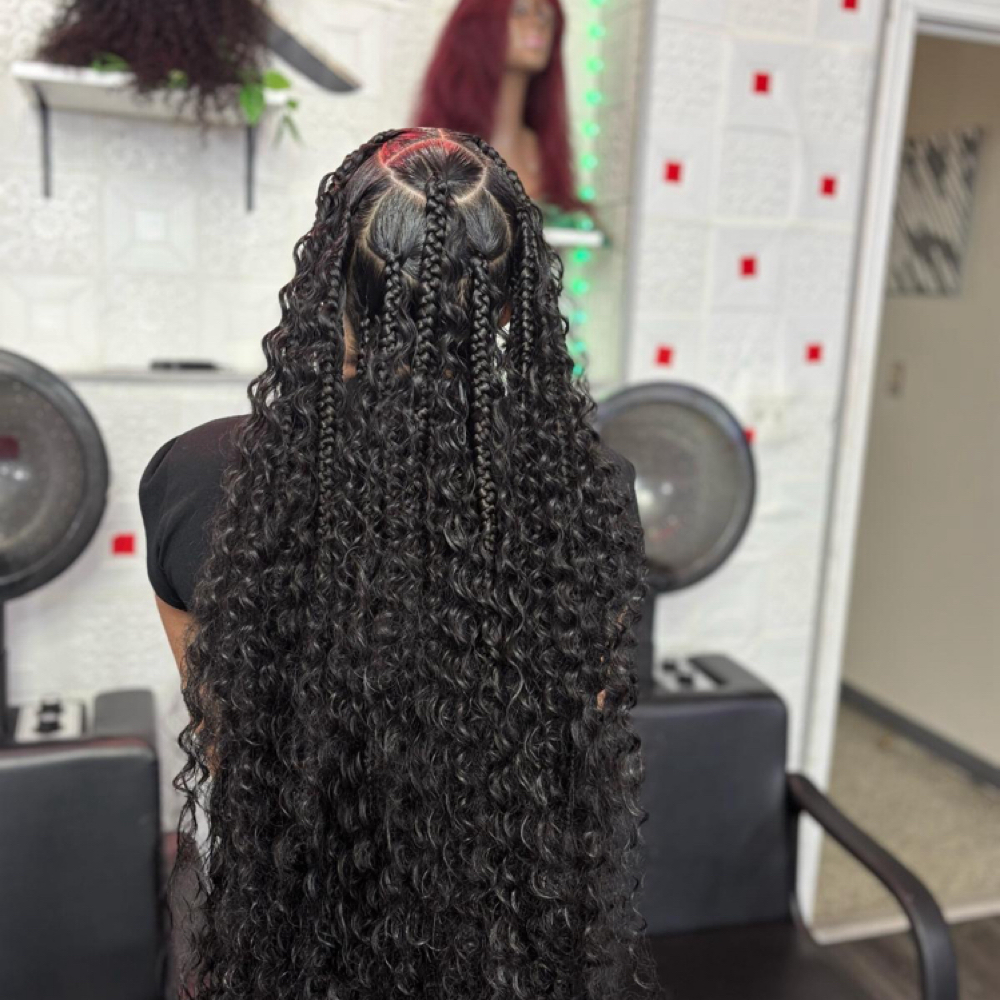 Large bohemian braids hairstyle at Alizah’s Hair Salon in Indianapolis, IN