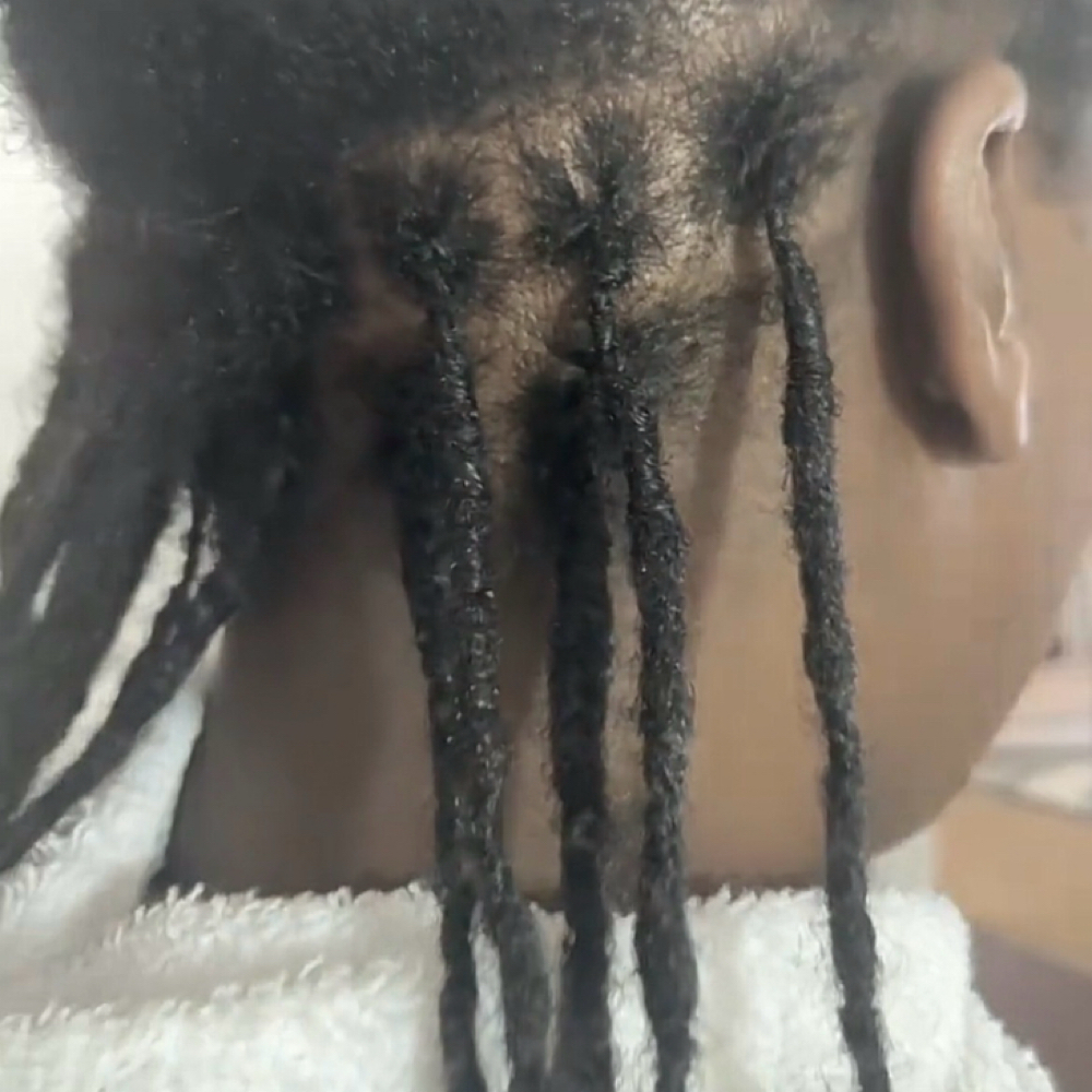 Loc Re-tie (Interlock) at Simply Beautiful Hair Care in Lithonia, GA