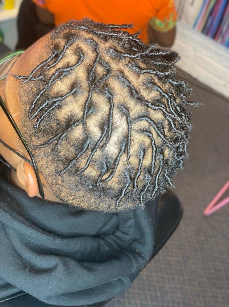 Step:1 Retwist Half A Heaf Of Locs