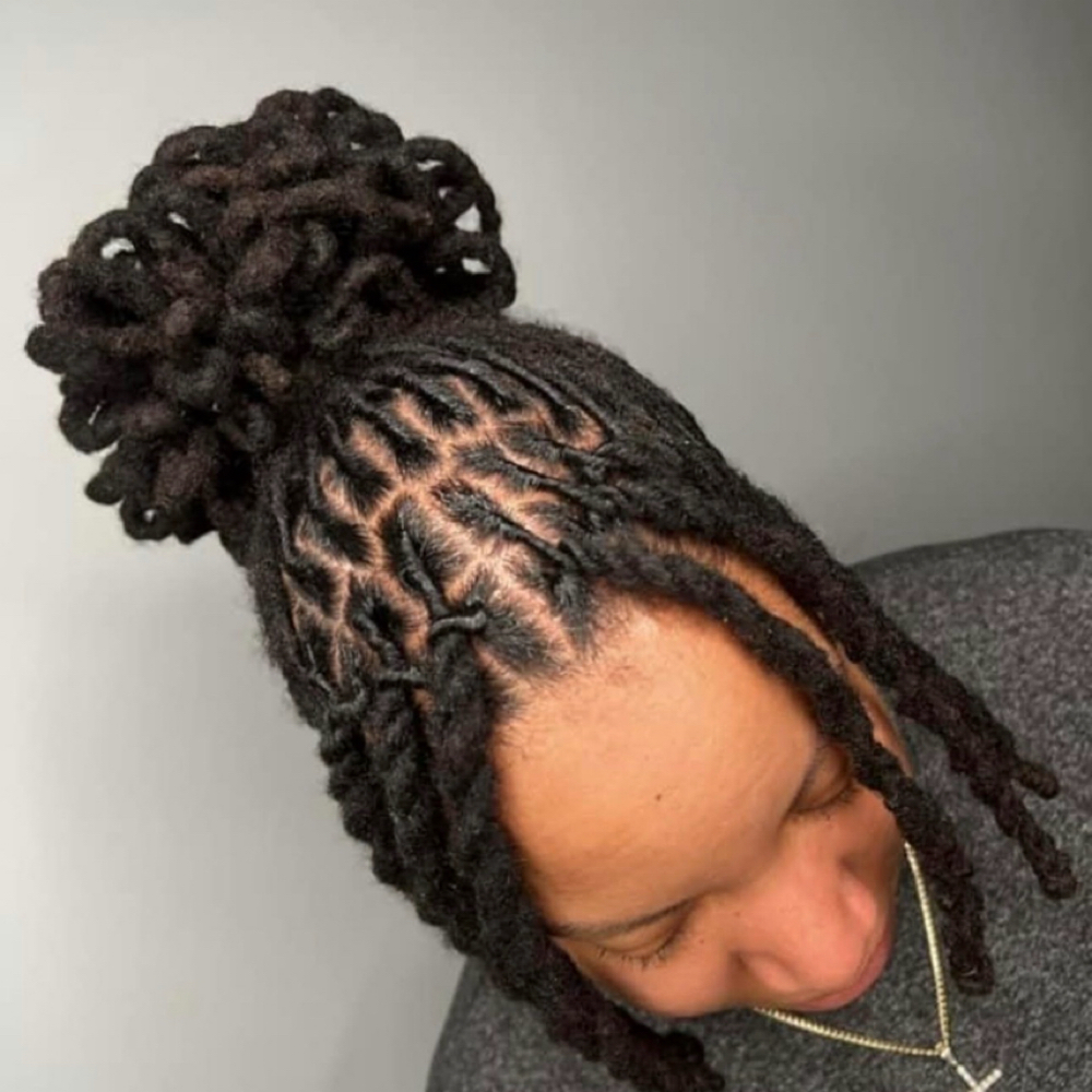 Retwist/Petal Bun/ Two Strand Bangs at IDentity X Glam in Syracuse, NY