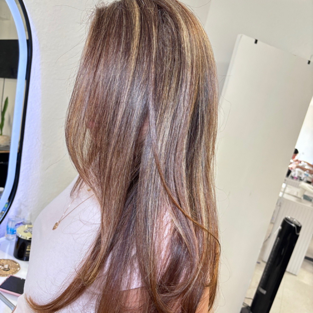 Partial Highlights at Gina's Hair Studio in Eagle pass, TX