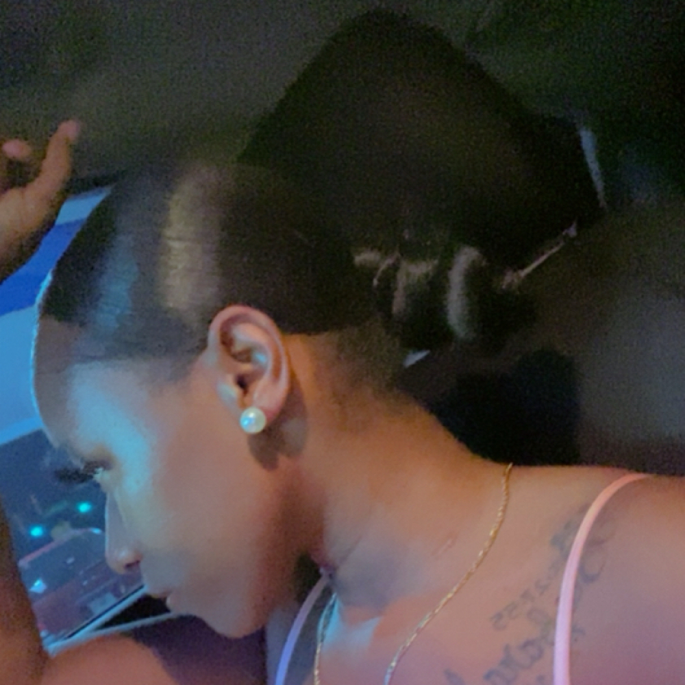 Low Knot Bun at Laid by Lannec’ in Claxton, GA