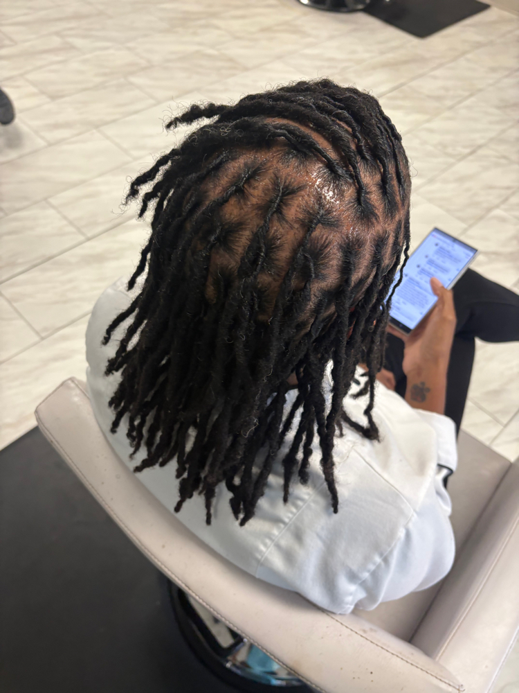 Mid Back Retwist at XquisitlyFor in Augusta, GA