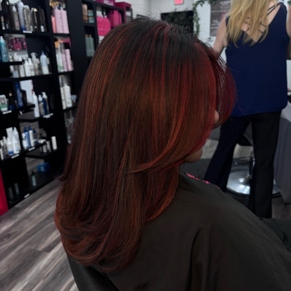 Red balayage at Gina's Hair Studio in Eagle pass, TX