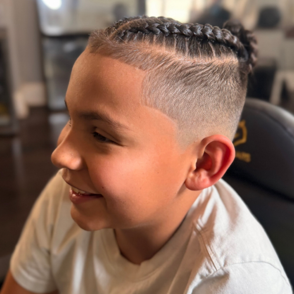 Mini Boss fade with braids at Brittany at The Bella Lounge in san antonio, TX