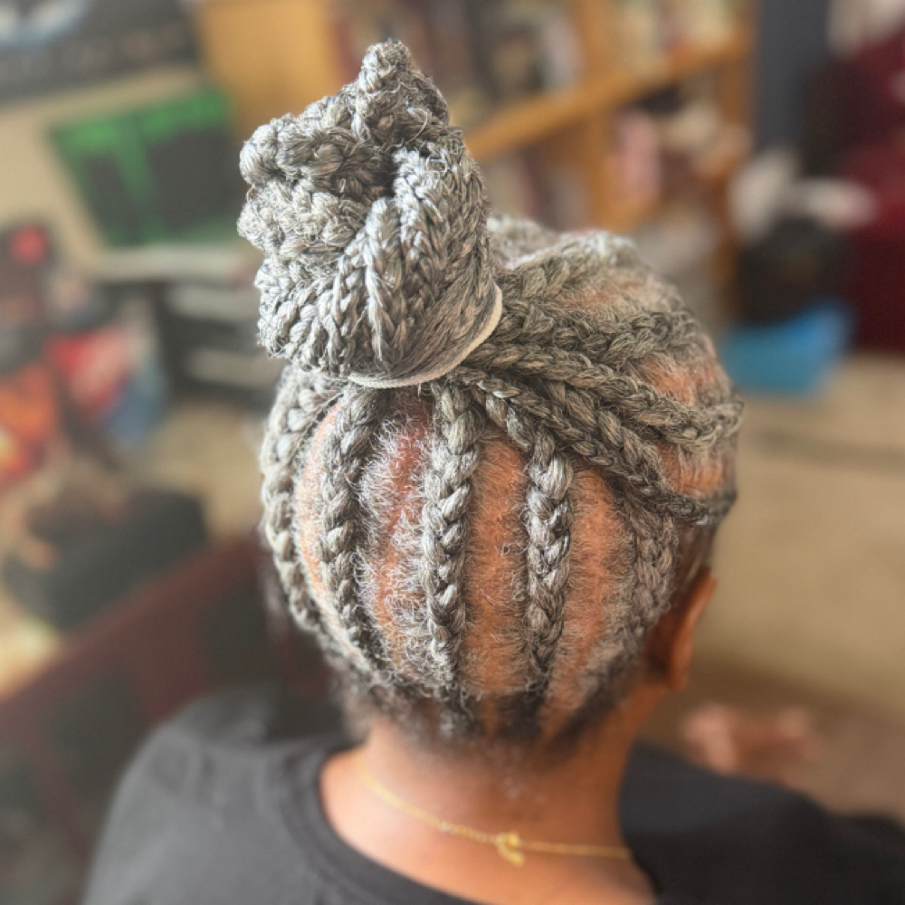 Stitch-Weave Cornrows (Into A Bun) at Designz by Destinii in Houston, TX