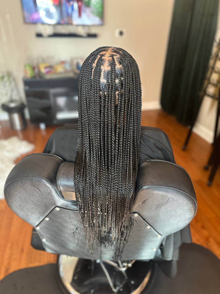 Medium Basic Length Knotless Braids at K.M.H.&S. Braiding in Chicago, IL