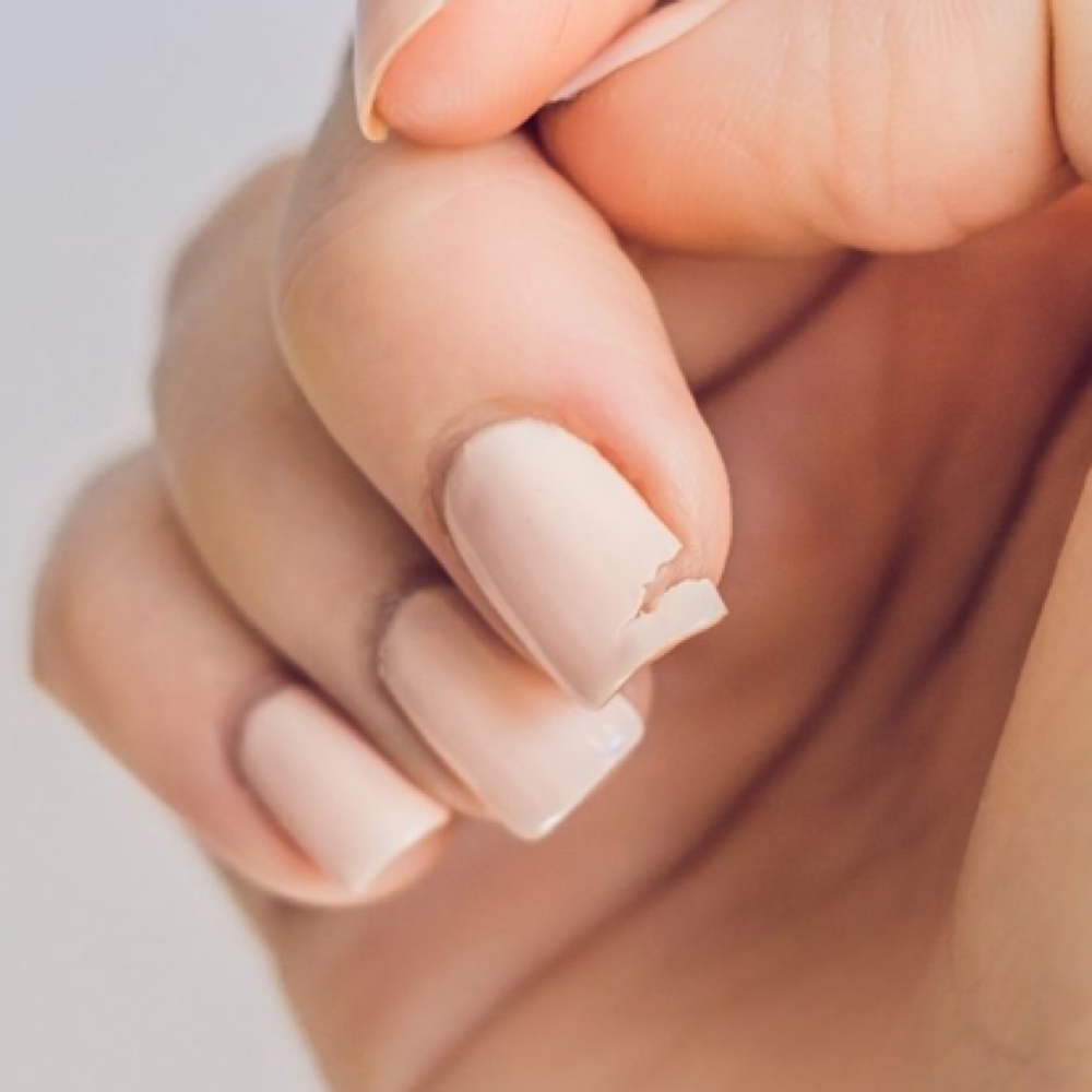 nail repair at Unwind Beauty Co. in Churchville, NY