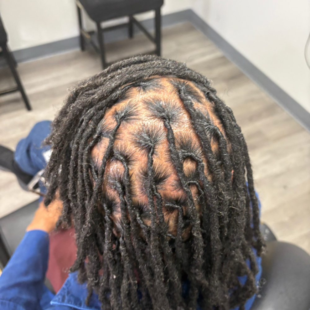 Retwist (mid/past shoulders) at Loc’d By Deez Handz in North Little Rock, AR