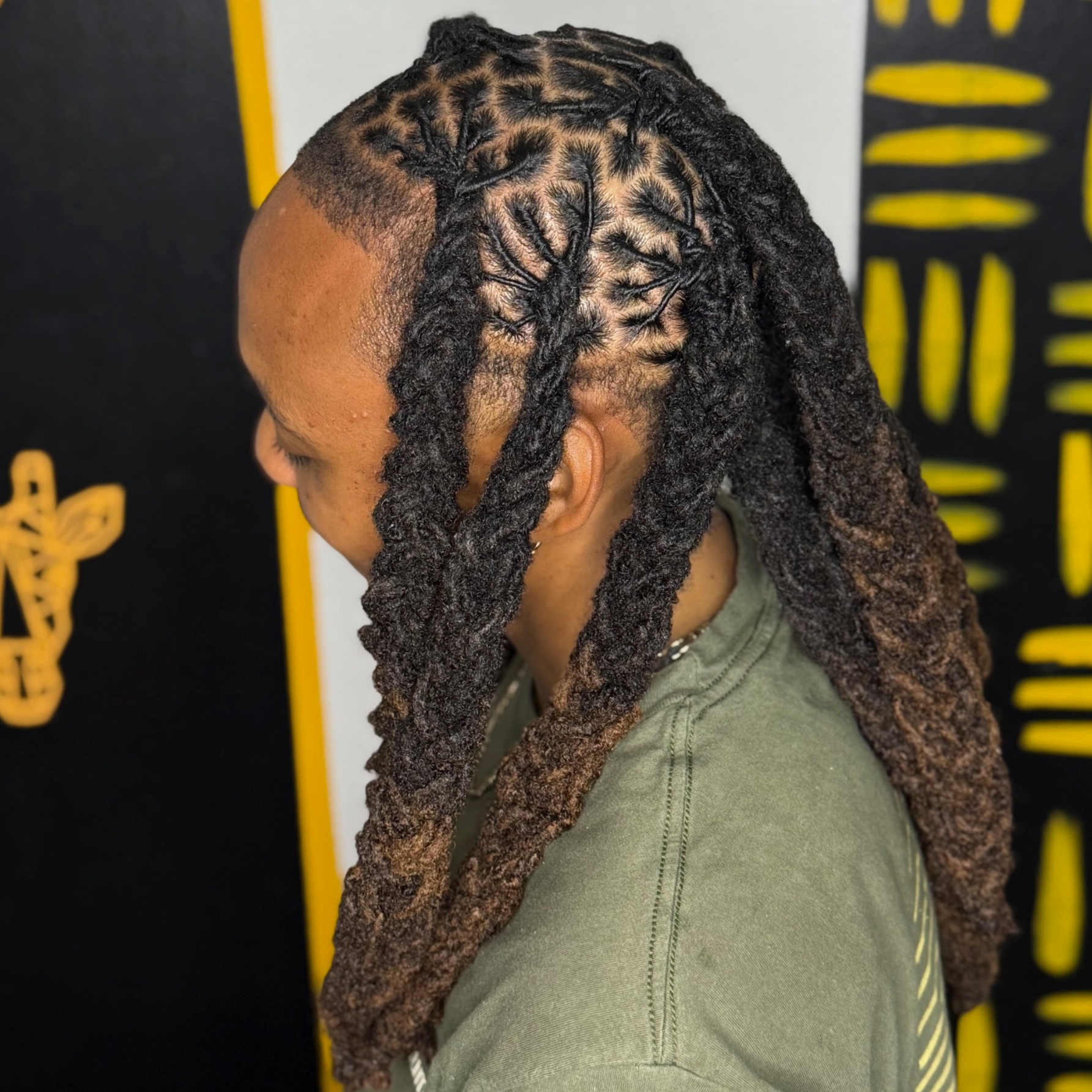 Loc Retwist + Style at HALOD BEAUTY HOUSE in Jackson, MS