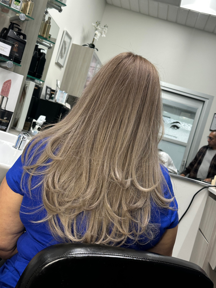 Long haircut at Leidis Beauty Studio in West desMoines, IA