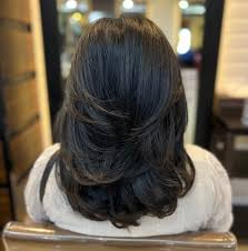 Long Layered Cut at Endless Elegance Salon & Spa in Castalia, OH