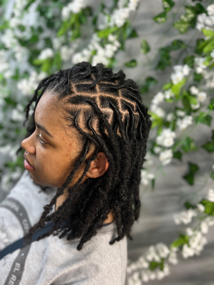Retwist Below The Shoulders at Nothing but Locs in Oklahoma City, OK