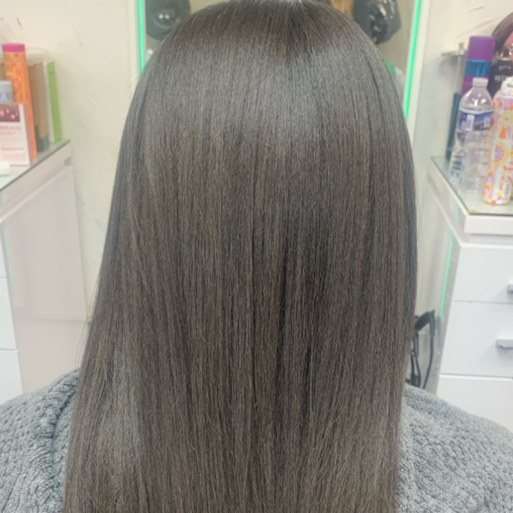 Silk Press at Giselles hairstyle corp. in Bronx, NY