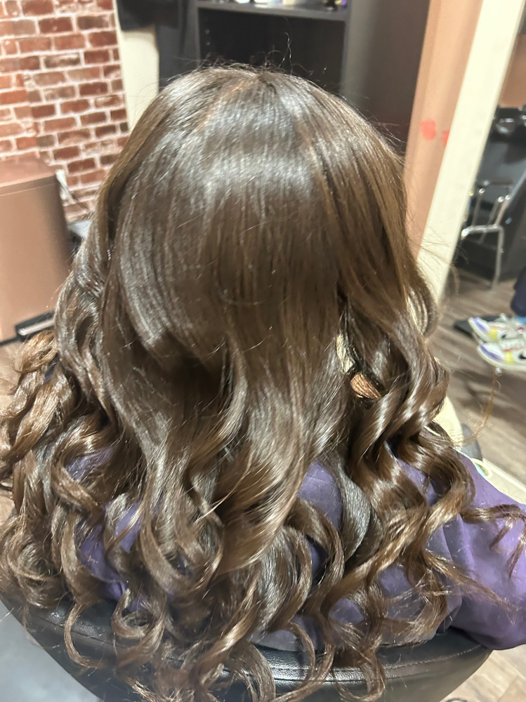 Silk Press Hair Styling at Velvet Crown salon in Memphis, TN