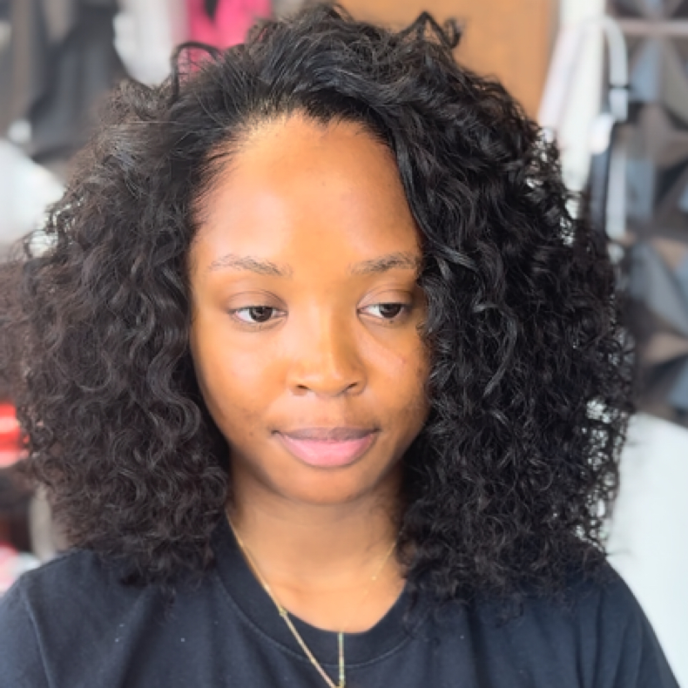 Quick weave at Exclusively The Luxe Salon in Missouri City, TX