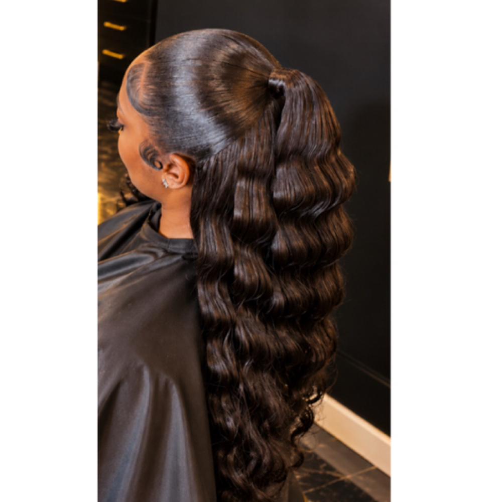 Half up/ Half down quick weave at Tresses in Memphis, TN
