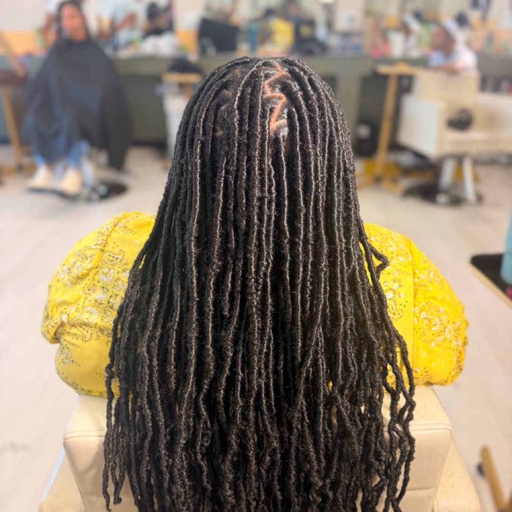 Midback Soft Locs at Takenja Thornton in Lithia Springs, GA