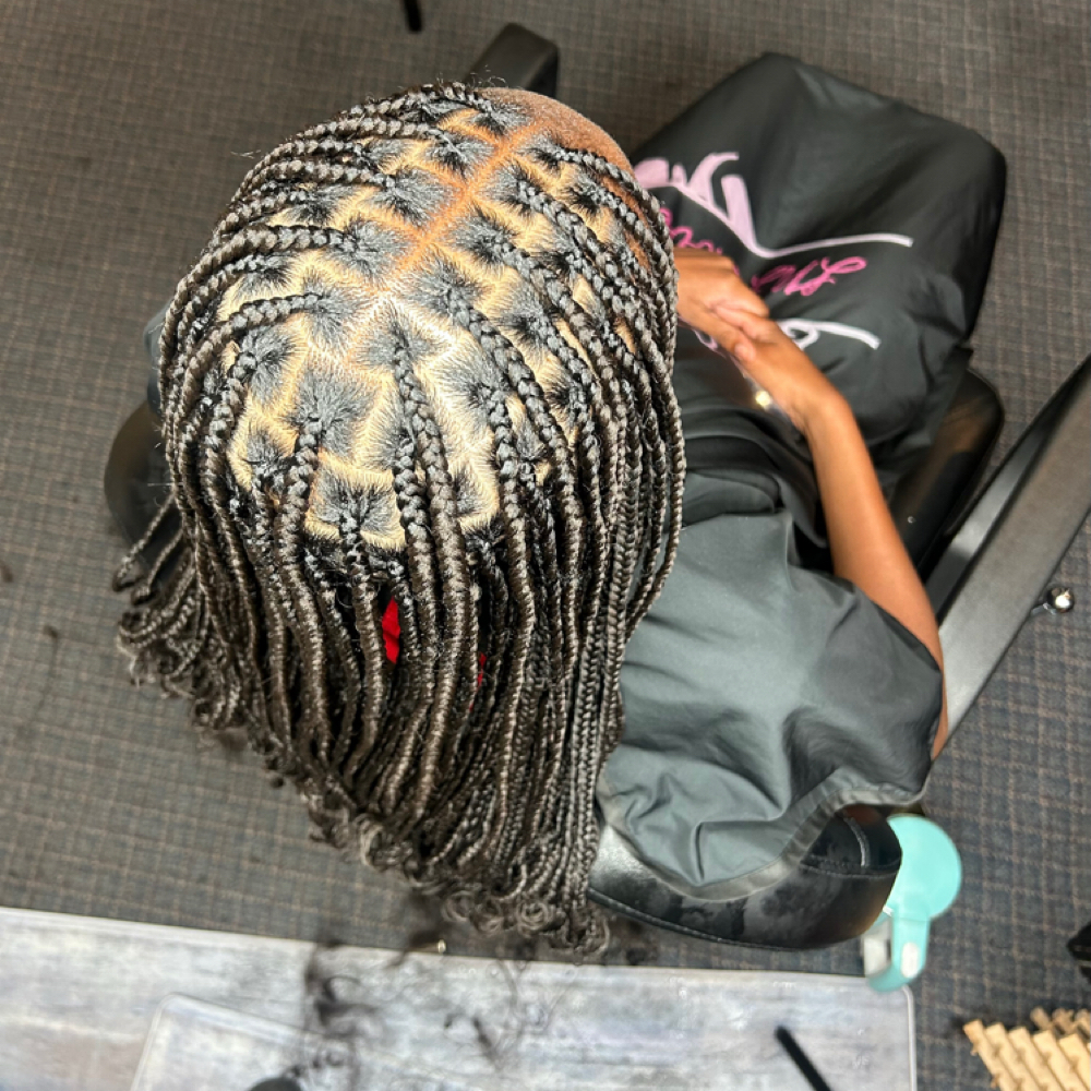 Knotless Box Braids at Locs O’ Luv by Nola in Bloomington, IL