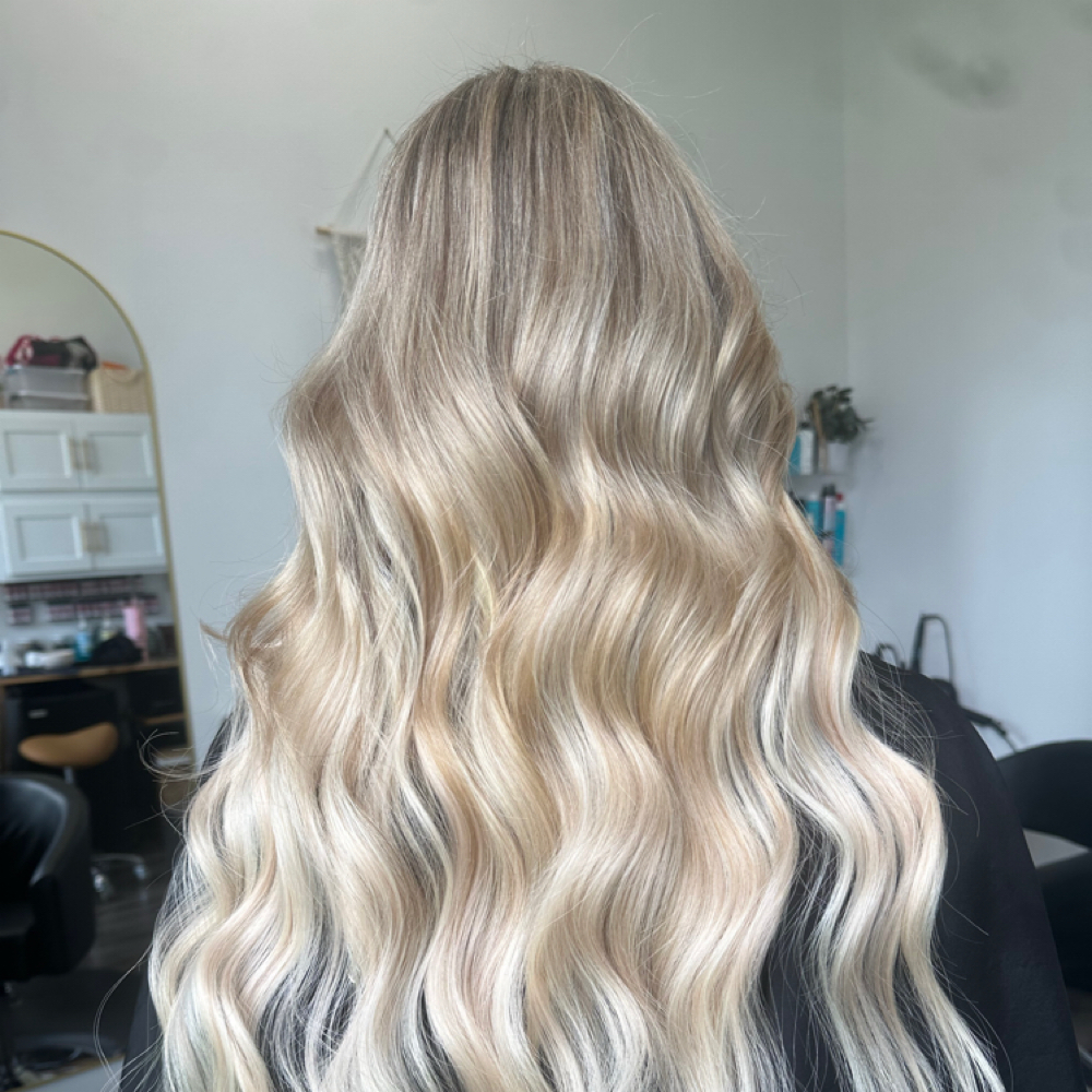 Butterfly Weft Extensions Move Up at Sydney Clark in Bowling Green, KY