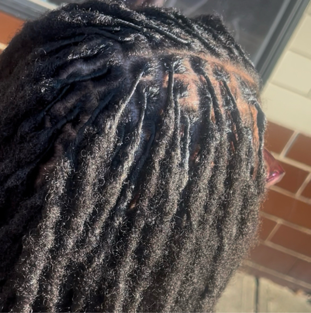 Loc Retwist (no style) at Dolledbythebratt in Fairborn, OH