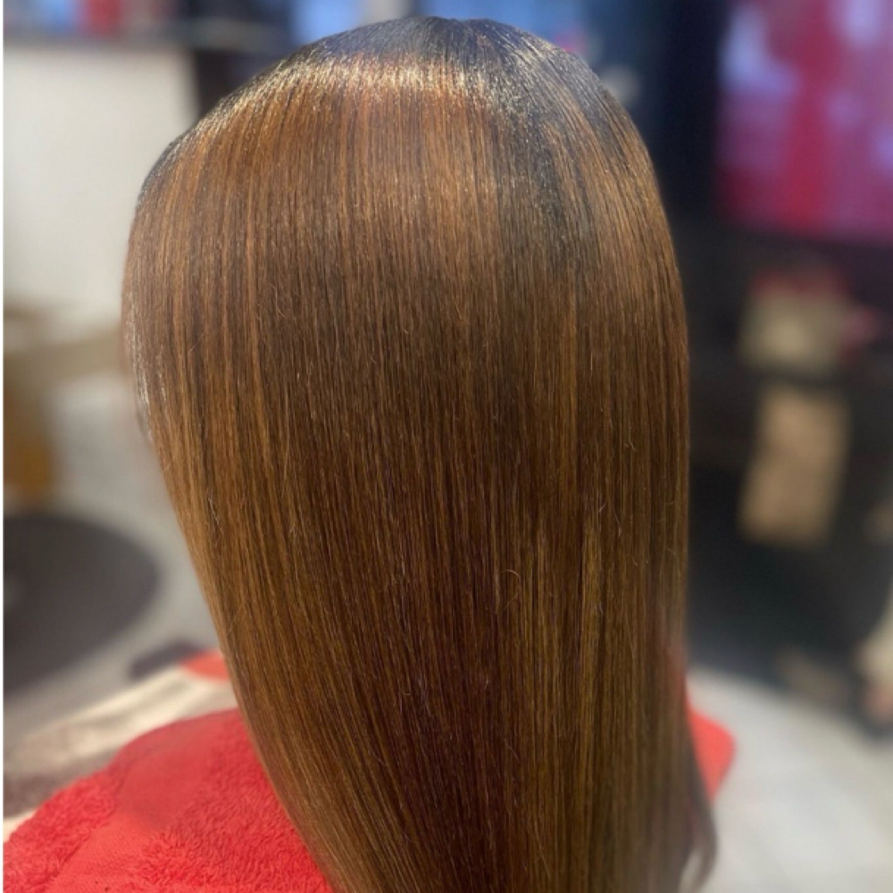 Silk Press W/ Treatment at Madame Jay Salon in Freeport, NY