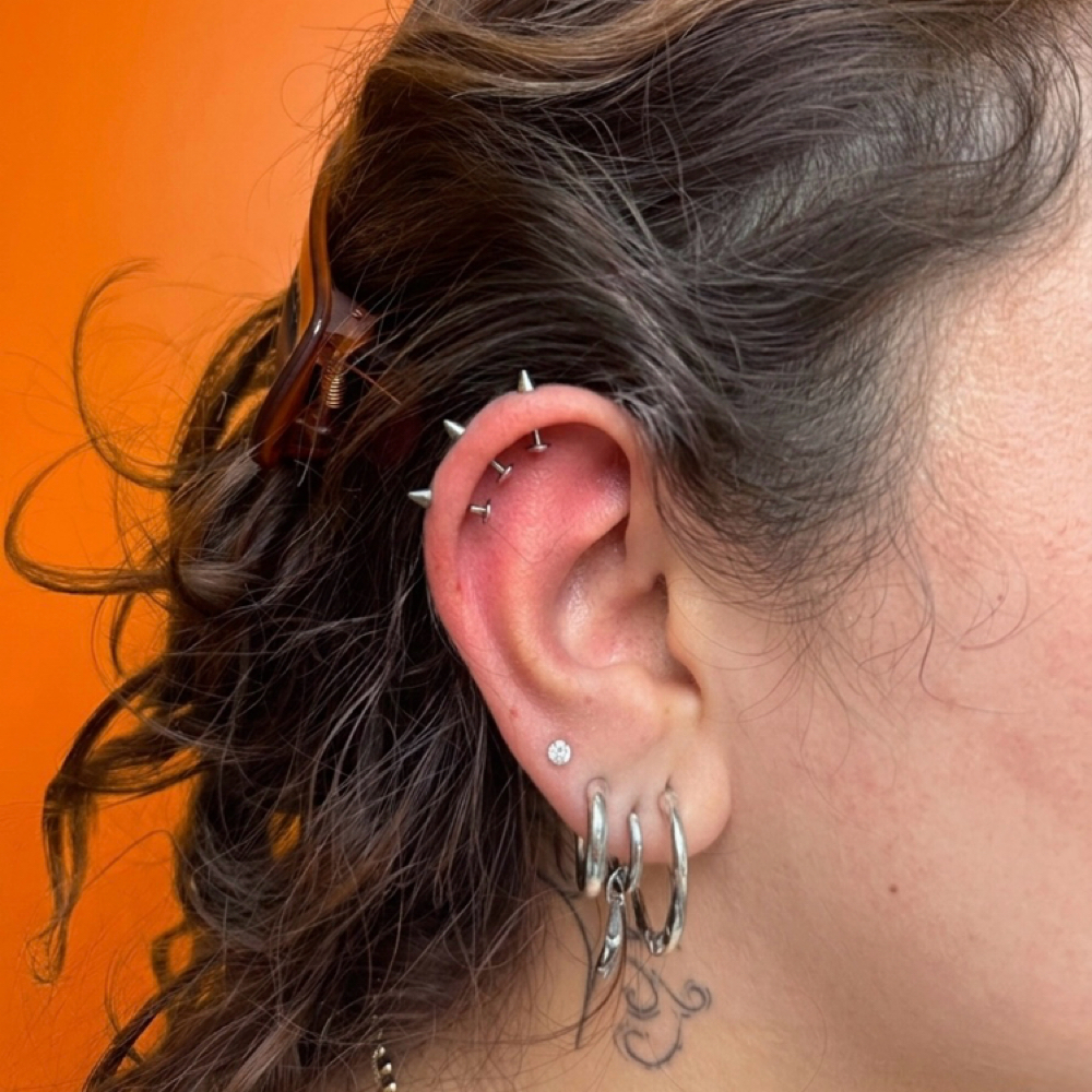 Vertical Triple Helix at Revision Body Art in Covina, CA