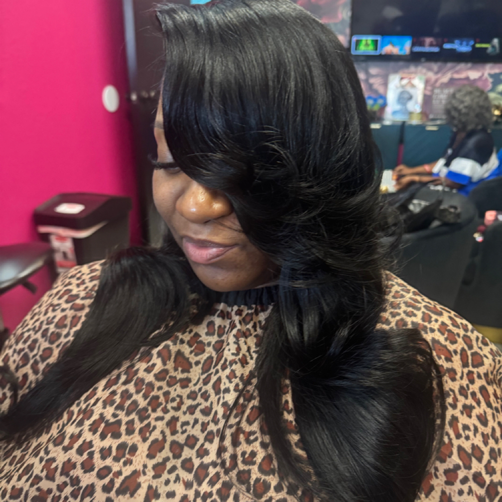 Long Quick Weave With Curls Or Wave at Innovative Hair Studio in Cincinnati, OH