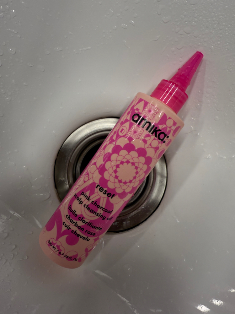 Amika Charcoal Scalp Cleansing Oil at Urban Hairtistry in Westminster, CO