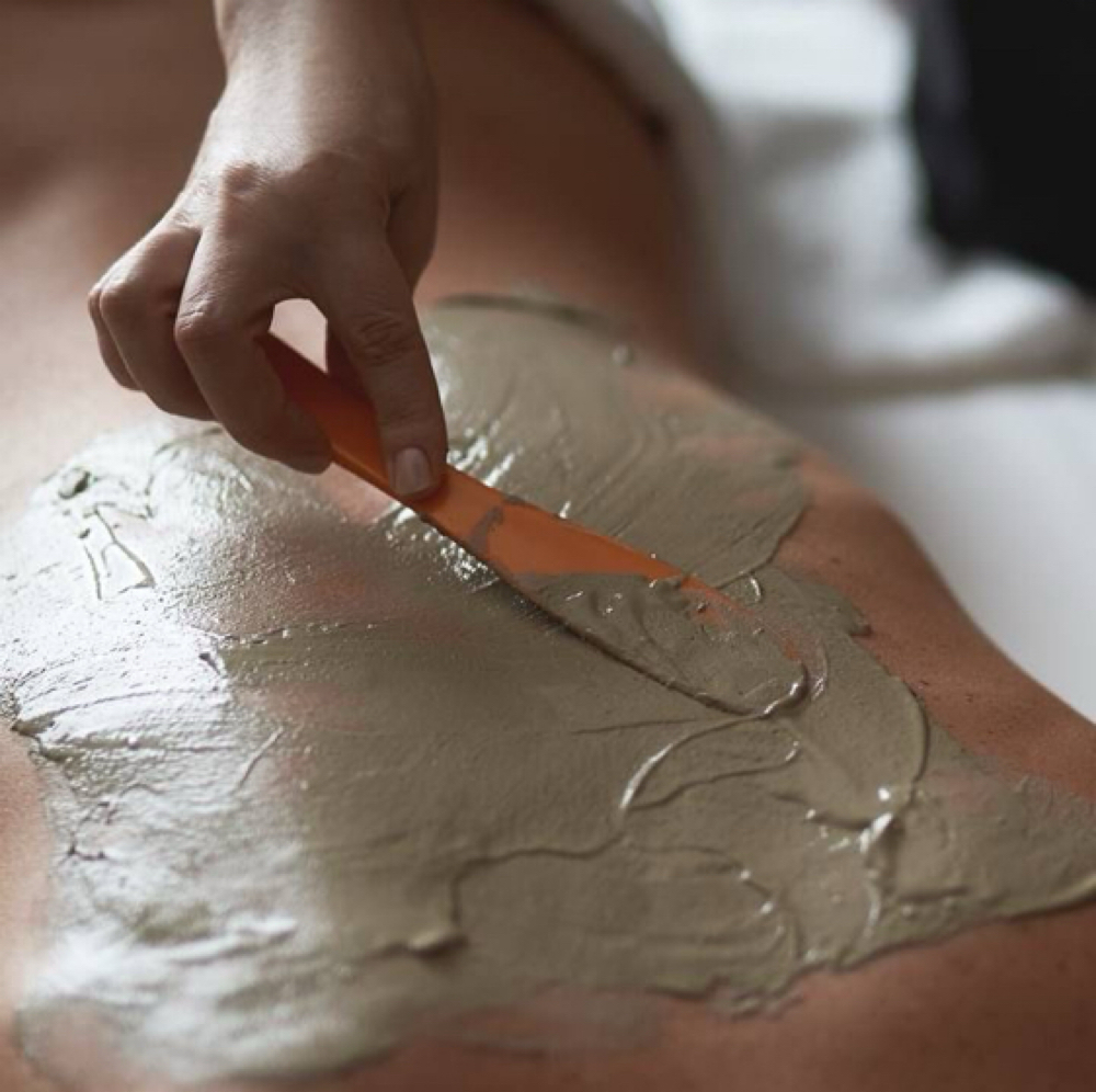 Back Facial at Doliveira Aesthetics in Cumberland, IN