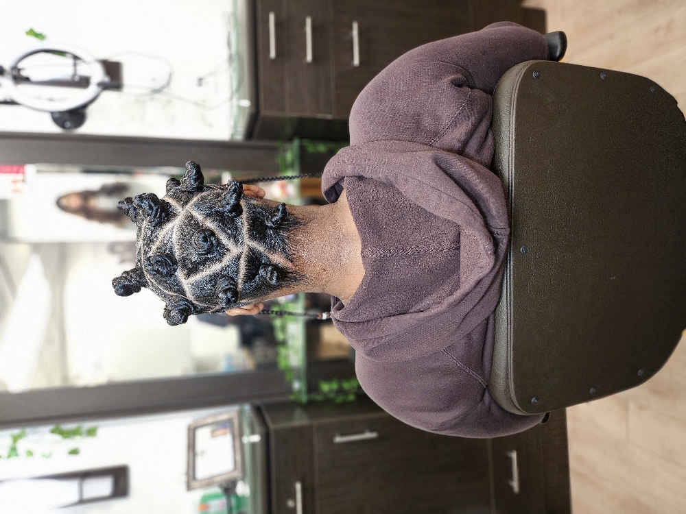 Bantu Knots at Jaybraidsandwigs in Baytown, TX