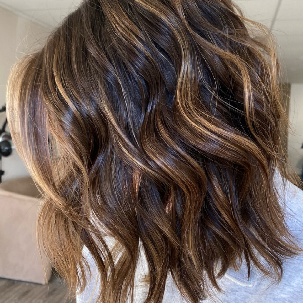 Womens Haircut at Dakota Beach Gölden Salon & Co. in Plymouth, MI