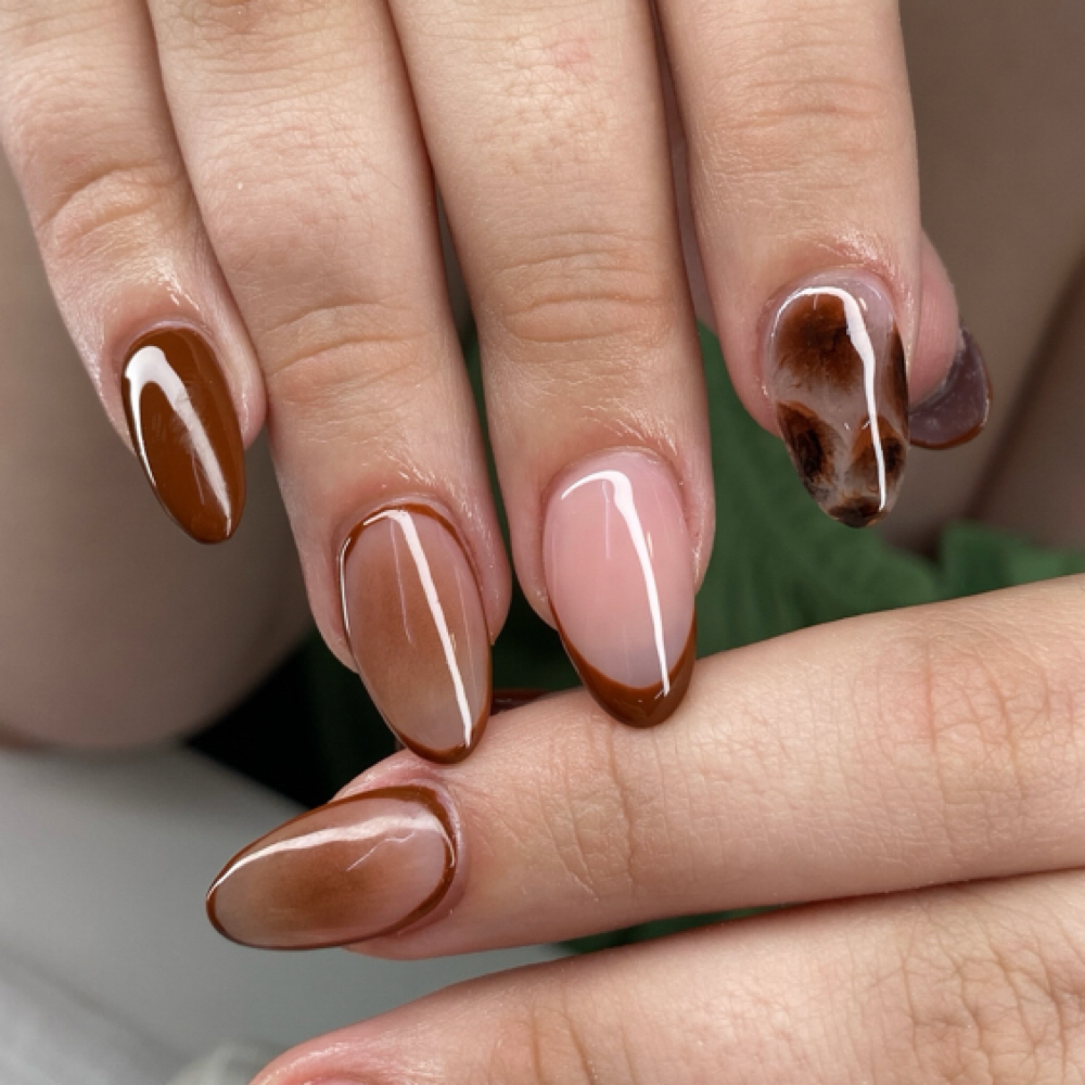 Glossy modern manicure at Angels by Manu