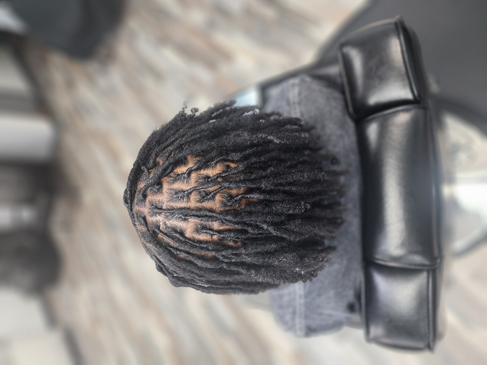 Retwist (Includes Wash And Drying )