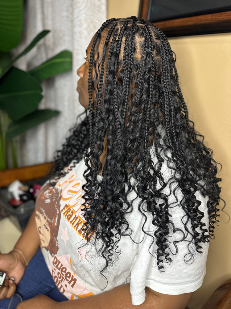 Medium Mid-back knotless Braids