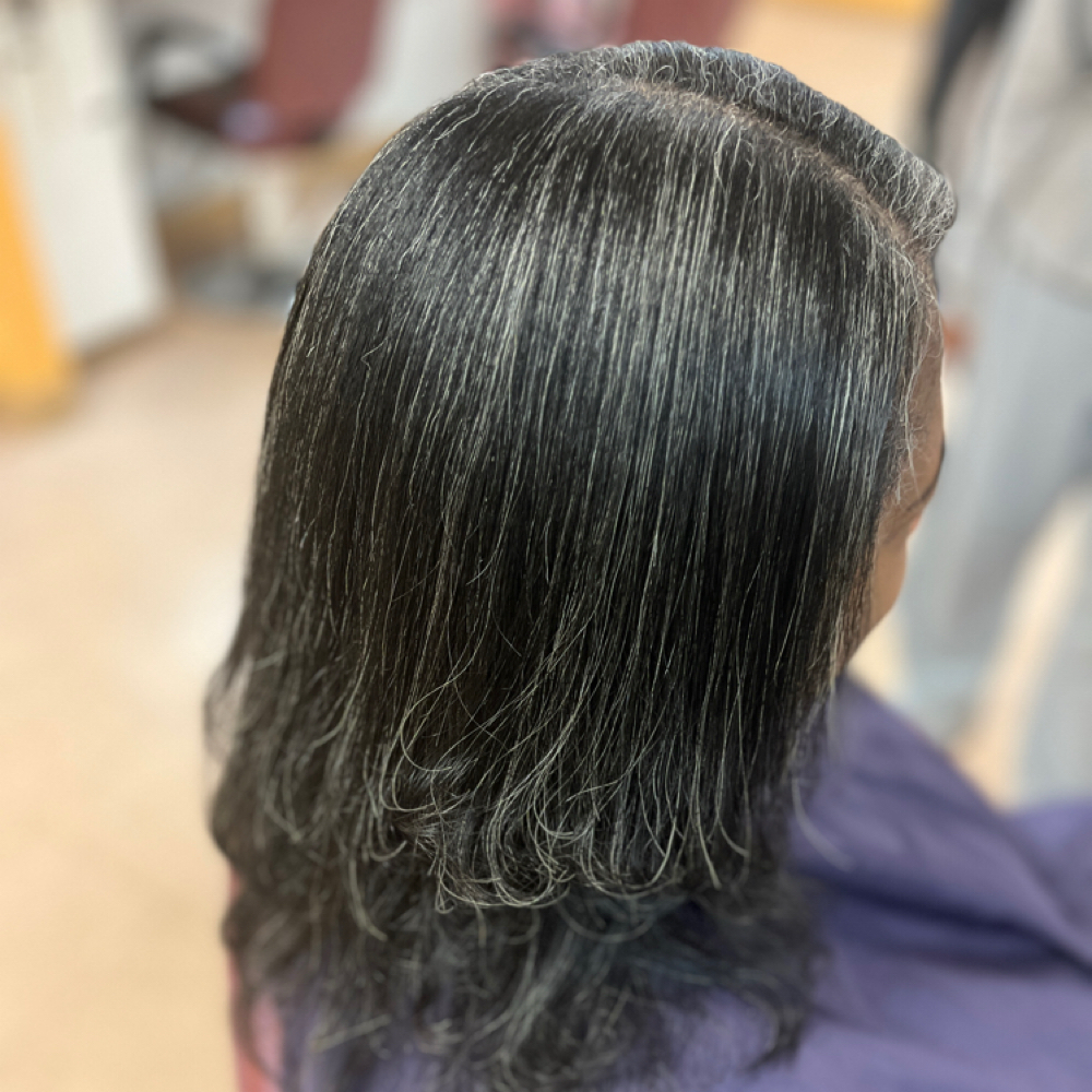 Silk press hair treatment at ZenStylez in Aurora, CO