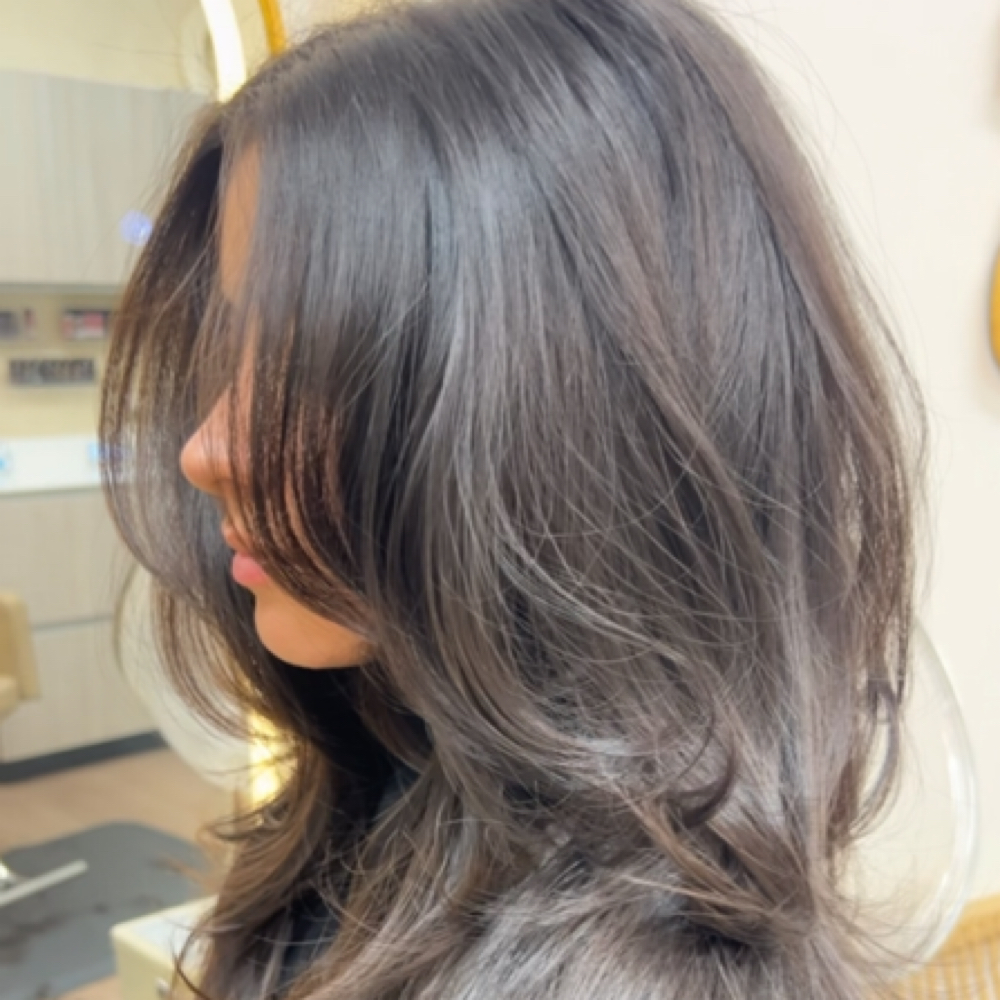 Shampoo & Blow Out Or Curl at Eli Higuera in Chula Vista, CA