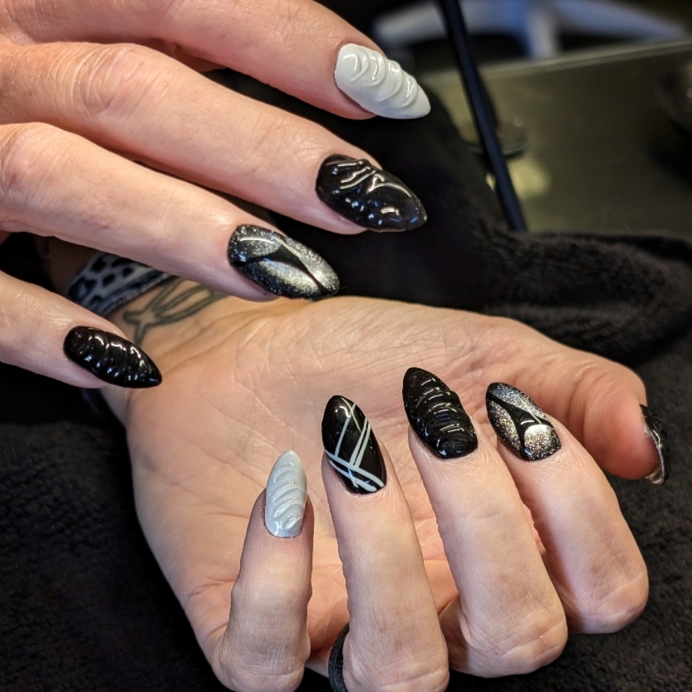 Signature at MJZ Nailed It in Derby, KS