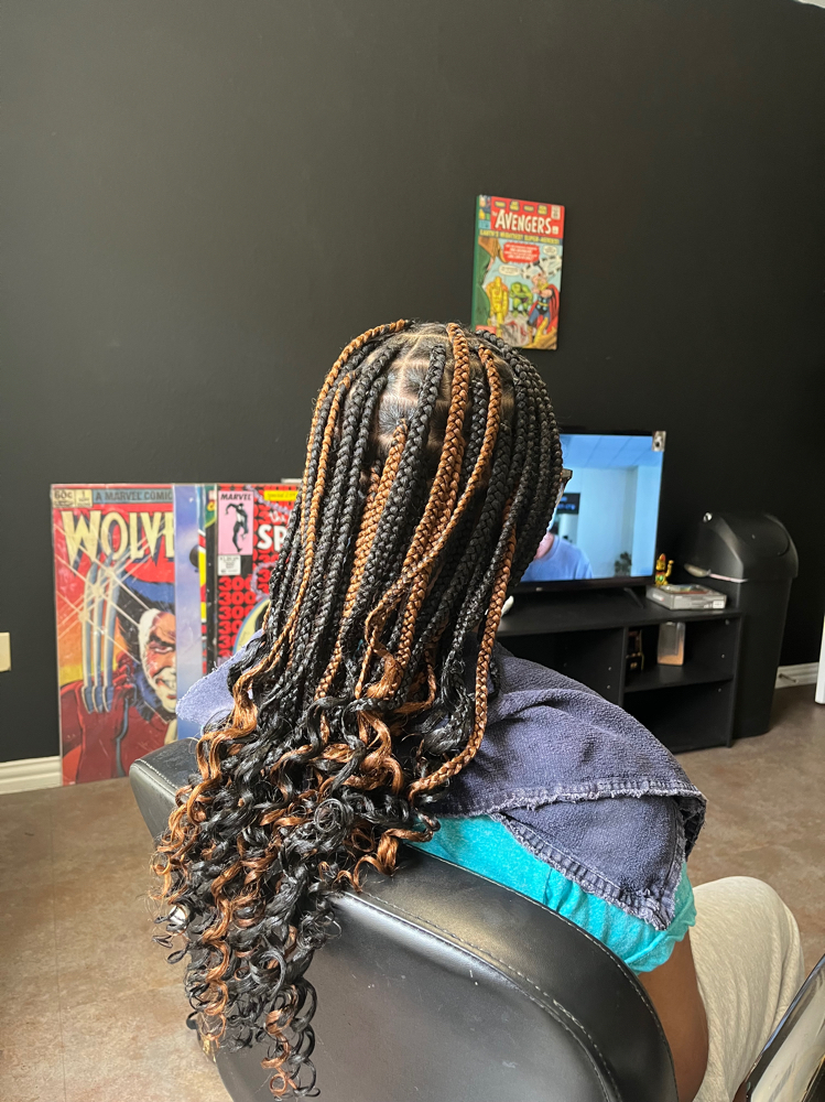 Medium Knotless Braids.