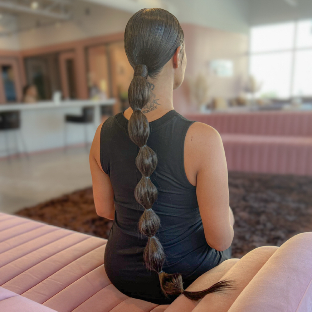 Extended Ponytails & Buns at XeNia Noir in Houston, TX