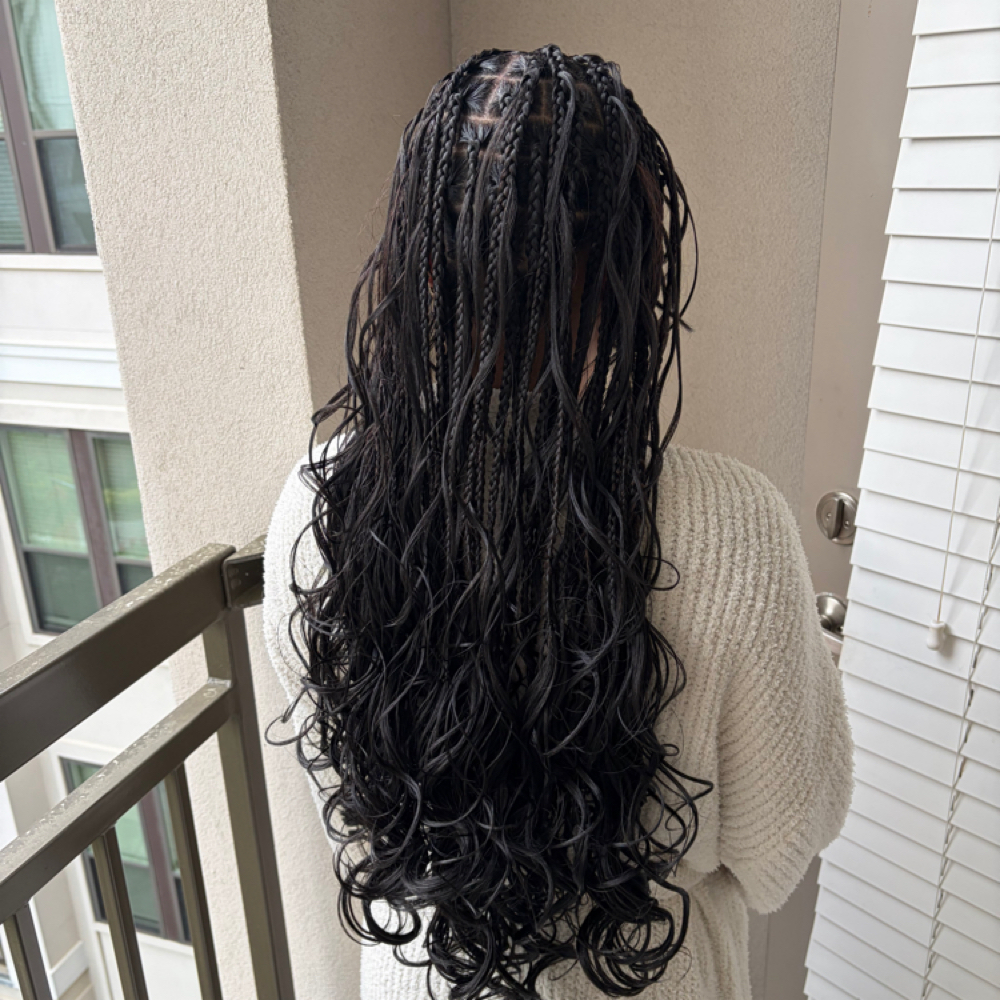 French Curl Knotless Braids at Nile Beauty in Stonecrest, GA