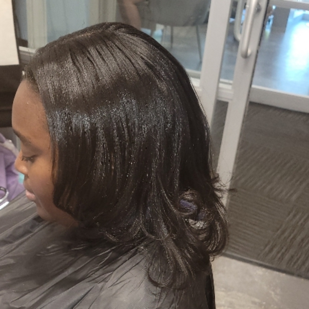 Relaxer Retouch at Nspired Hair Designs in Fort Myers, FL