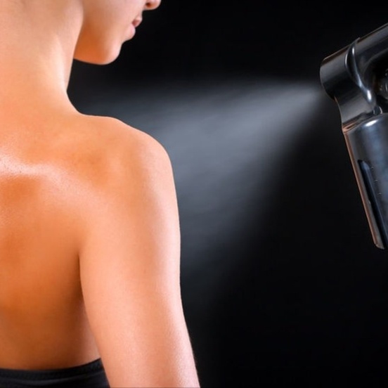 Model Spray Tanning at Permanently Beautiful in Marble Falls, TX