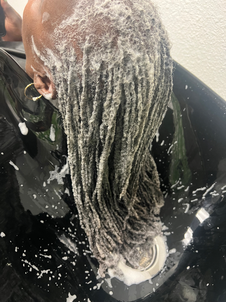 Sisterlocks Retie and Shampoo at Ari Slaughter in Jenks, OK