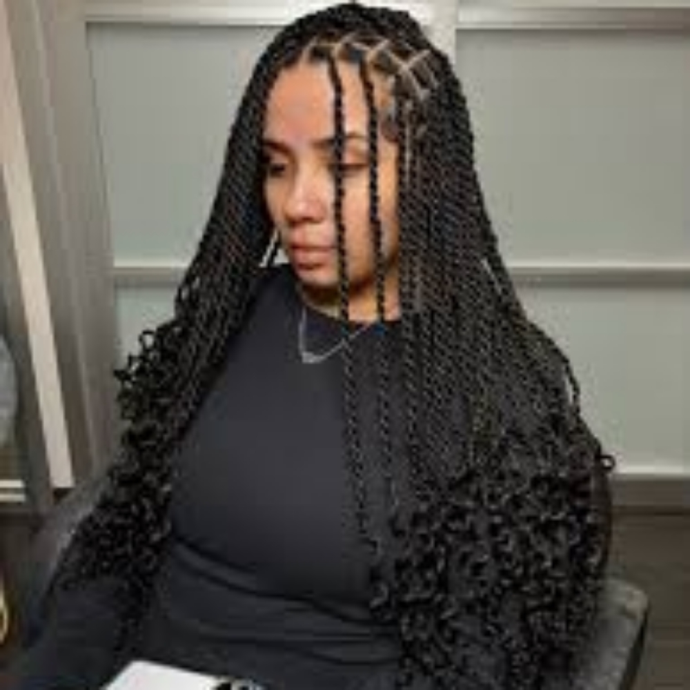 Medium mid back twist at HairByQweenCoda in Bridgeport, CT