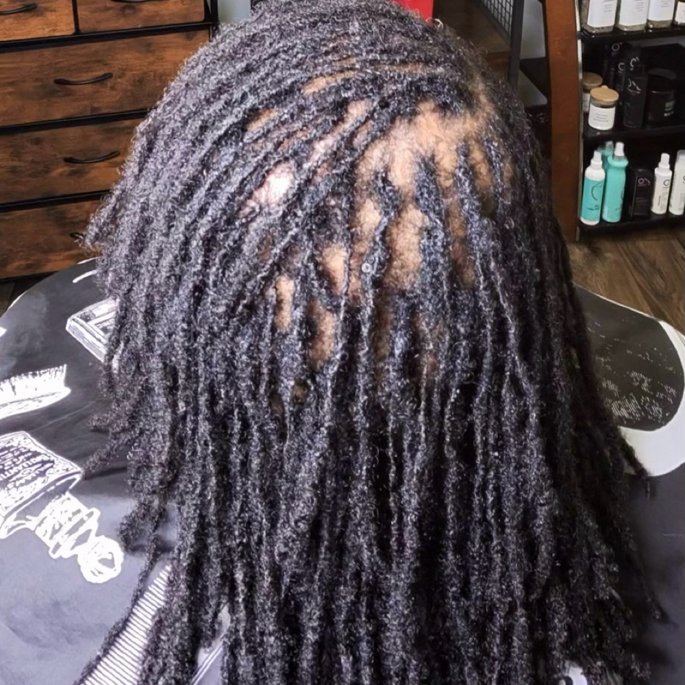 Traditional Loc Retie at Curly Roots Natural Hair Spa in Clarksville, TN