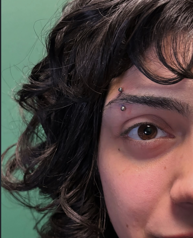Eyebrow Piercing at PunkturedByKal in Arlington, TX