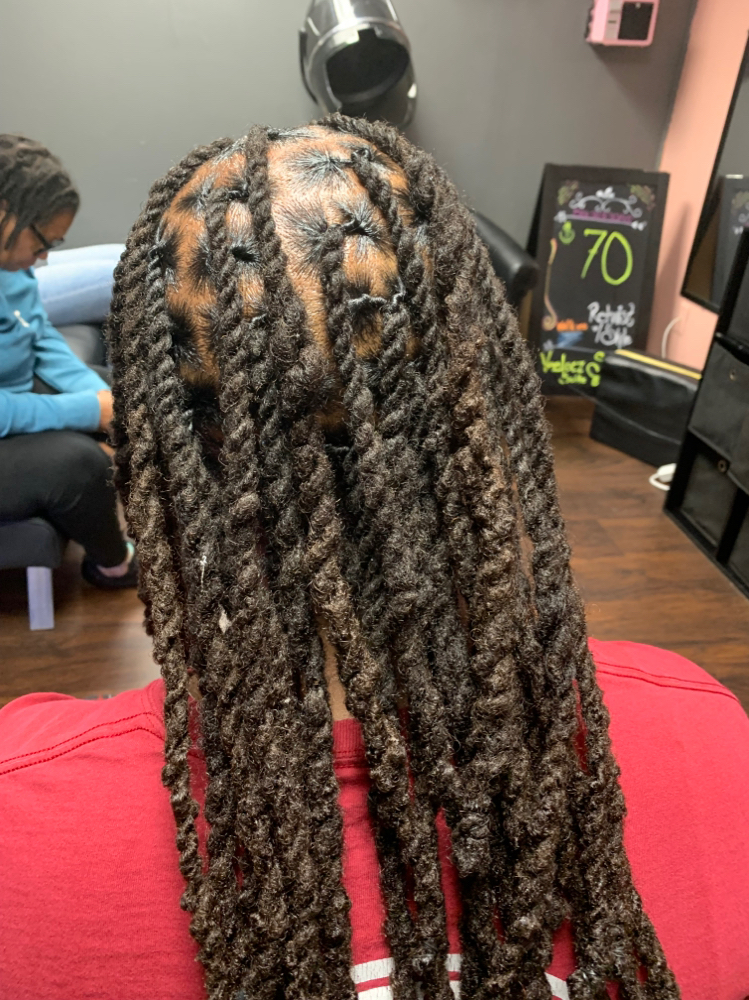 2 Strands (mid/lower back) at Loc’d By Deez Handz in North Little Rock, AR